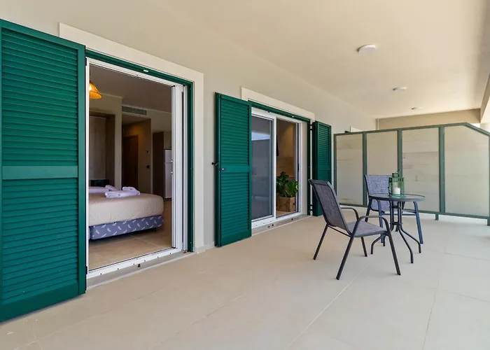 Momento Aparthotel 4*